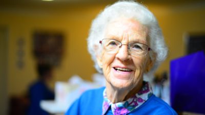 An older woman smiling