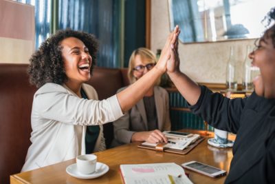 people giving each other high fives