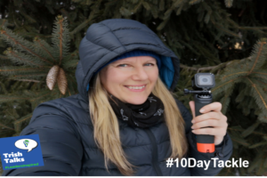 #10DAYTACKLE Patricia Regier holding GoPro with winter coat on