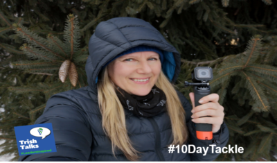 #10DAYTACKLE Patricia Regier holding GoPro with winter coat on