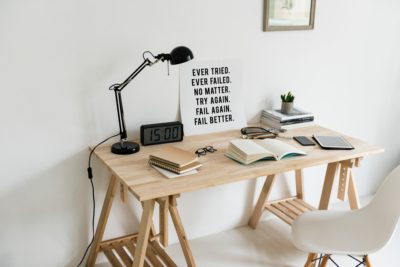 A desk with an open book on it