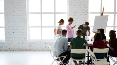 A group of people collaborating at a desk