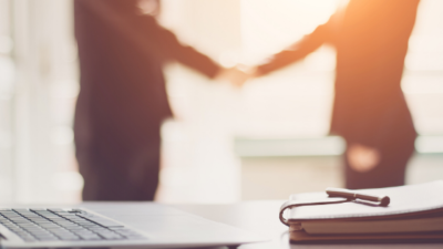 two people shaking hands