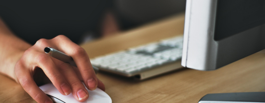 person clicking computer mouse