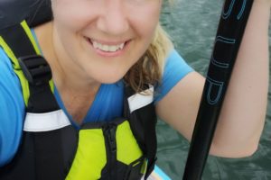 patricia on her stand up paddle board