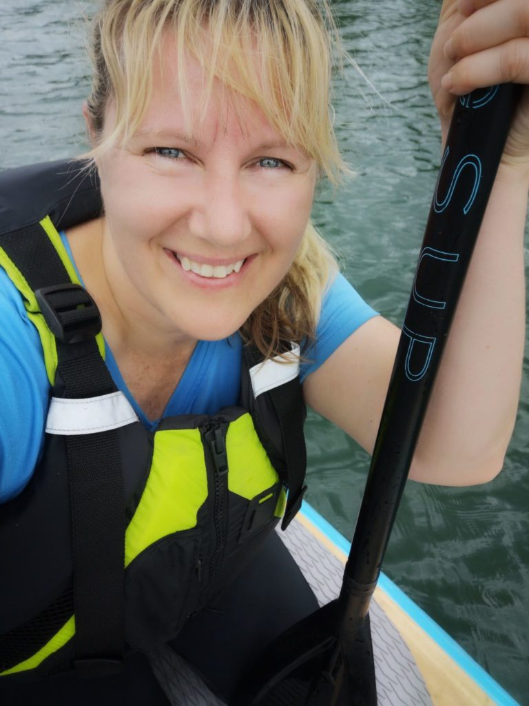 patricia on her stand up paddle board