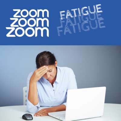 woman at computer with head in hand possible suffering from Zoom Fatigue