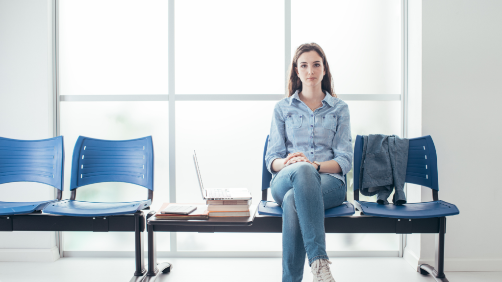 woman siting on chair in zoom waiting room