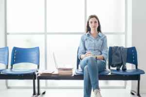 woman siting on chair in zoom waiting room