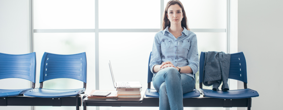 woman siting on chair in zoom waiting room