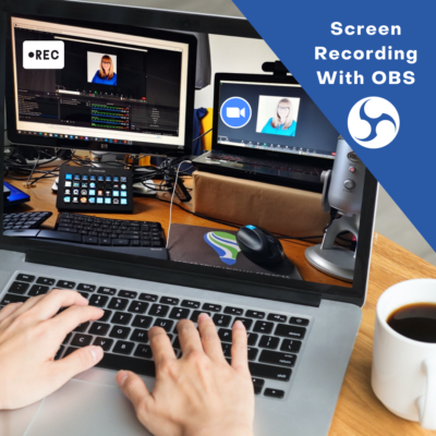 image of hands on a laptop keyboard showing 2 monitors