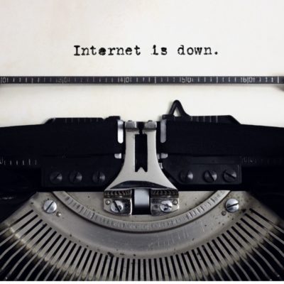 image of typewriter with paper that reads, internet is down