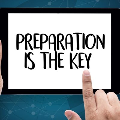 image of finger pointing to a screen that say preparation is the kay to a