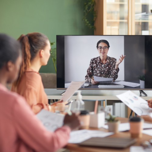 hybrid meeting in person and on computer screen