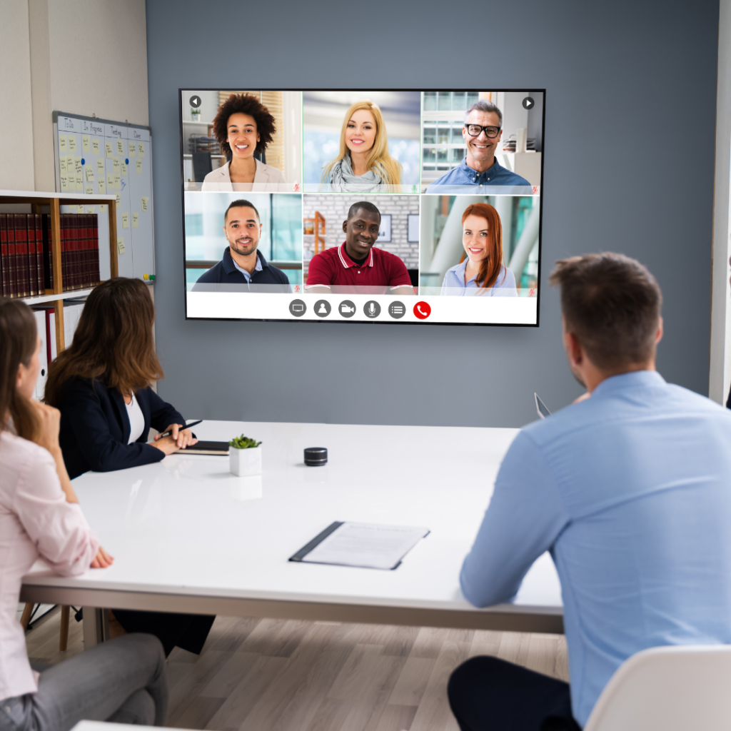 hybrid meeting in person and on computer screen