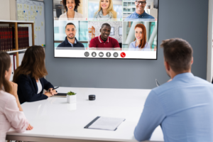 hybrid meeting in person and on computer screen
