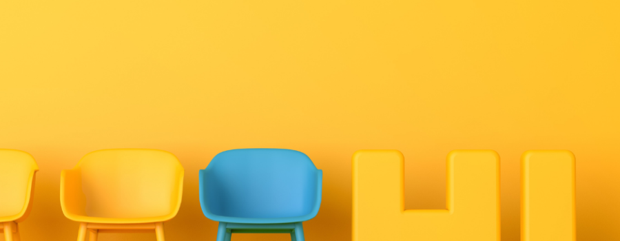 Friendly zoom waiting room yellow walls yellow chairs a blue chair and the word hi