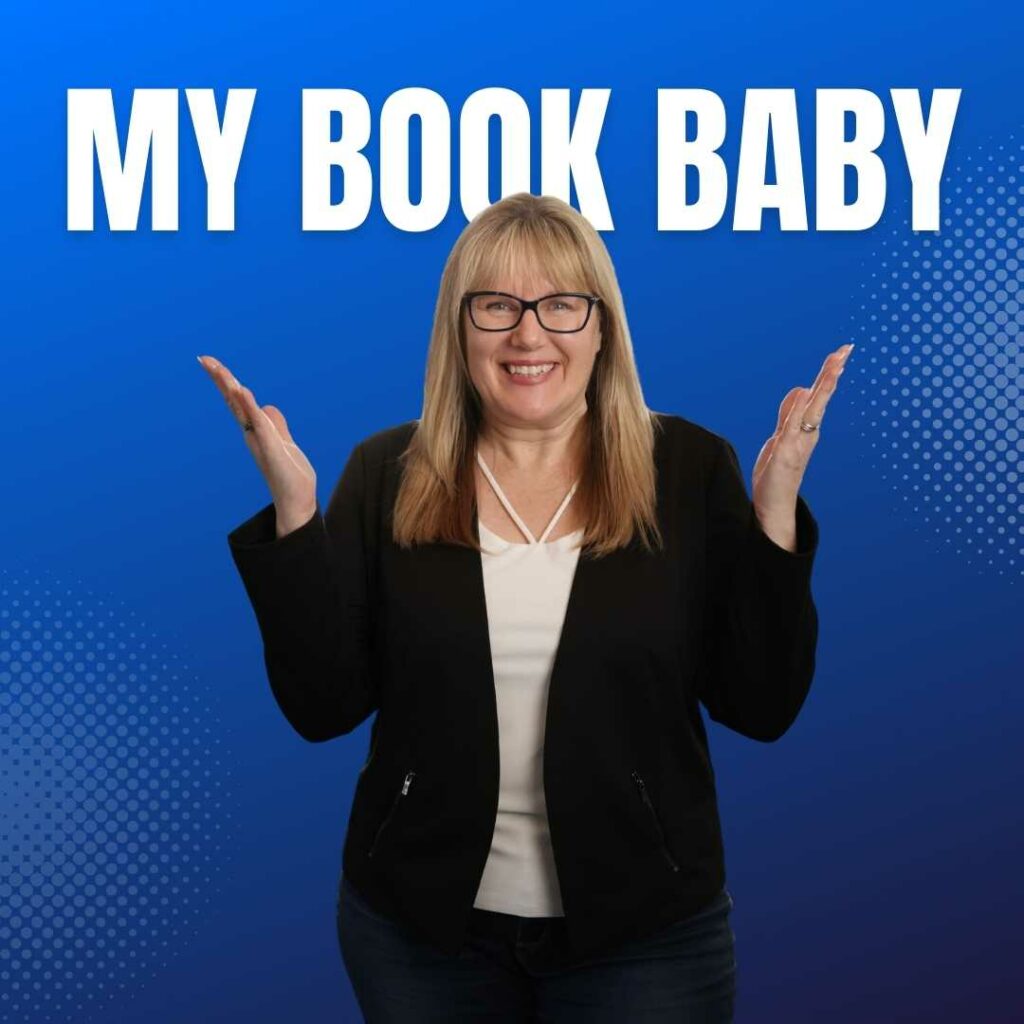 Patricia in black suit hands up smiling with the words My Book Baby