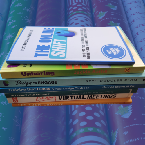 Books stacked listed within blog wrapping paper behind the books