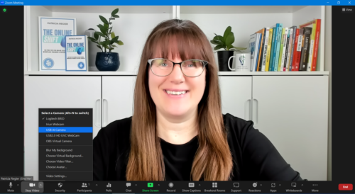 Patricia in a Zoom meeting, selecting the EnSonore AI camera 