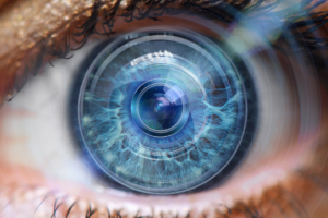 Visuals represented with one eye colour blue with a computer overlay