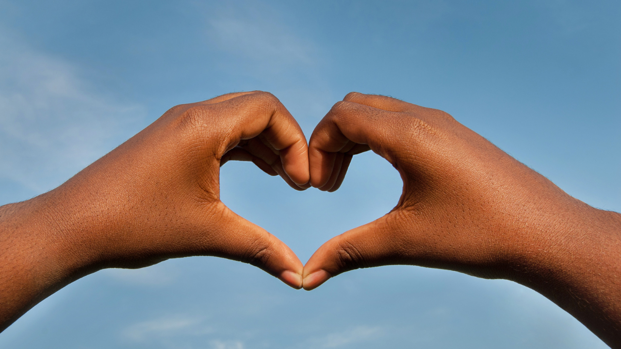 Facilitator self care hands in a heart shape